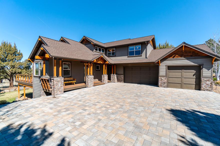 Huge Cascade views from this custom 3,334 sq ft. home on quiet cul de sac in the West Ridge at Eagle Crest! Open main floor plan, vaulted ceilings, cultured stone at great room fireplace, distressed hardwood floors, knotty alder wood trim. The kitchen beckons with granite slab countertops, top of the line stainless steel appliances, walk in pantry, wine chiller! Den off the great room has built-in desk, matching cabinets, and windows to the world outside! Upstairs the primary bedroom en suite has radiant floor heating, gas fireplace, soaking tub with heated backrest, walk in tile shower with dual showerheads. Other highlights of this home include 3 car garage, central vac, unique tile and stone backsplashes throughout, mud room with separate entrance, laundry room with laundry chute, Nest smart home system. Daylight basement guest quarters has wet bar and wine cellar. Eagle crest offers 3 sports complexes, 3 golf courses, trails, dining options and more. Come see this gem!