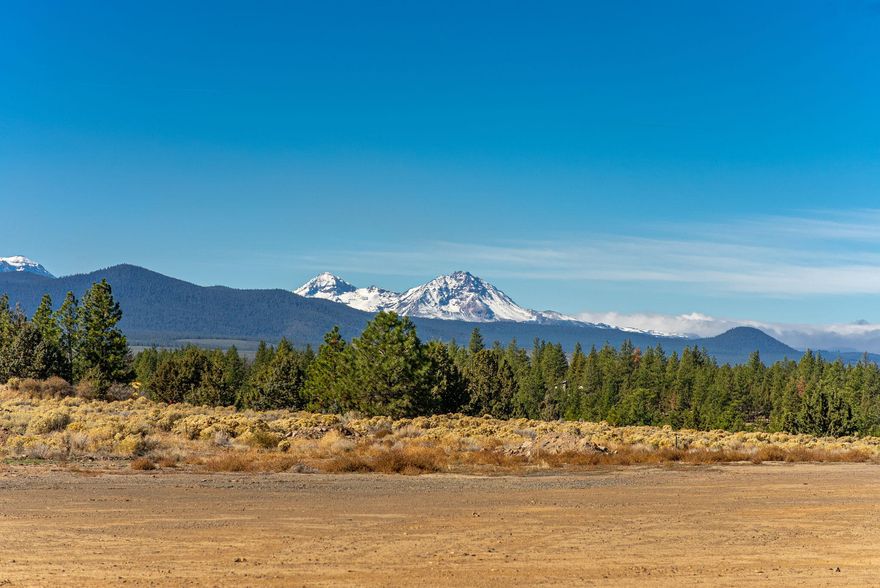 Discover the perfect setting to build your dream home on this spacious 2.5-acre lot in Skyline Ranch, one of the most desirable and  private communities in NW Bend. Enjoy breathtaking Cascade Mountain views (Three Sisters, Mt Washington and more) as your everyday backdrop, with level terrain offering the ideal canvas for your custom build. Nestled just outside the city limits yet close to schools, Northwest Crossing, and downtown Bend, this property blends beauty, privacy along with convenience. Skyline Ranch backs directly to Bend's iconic Shevlin Park, offering endless adventures with access to trails, Tumalo Creek  and all the natural beauty this area is known for. Power, Bend city water, and Cascade Natural Gas are available at the lot—everything you need to start creating your Central Oregon retreat.