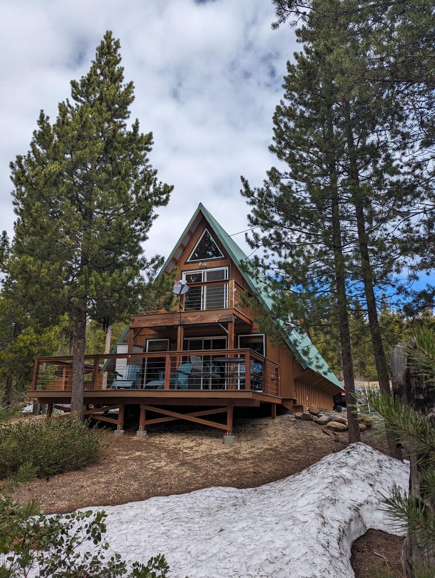 Beautiful A-Frame cabin on an acre close to Crescent, Odell Lakes and Willamette Pass ski resort. Large garage with 776 SF upstairs usable space in addition to the 1088 SF main cabin for approx 1864 sf of furnished space. There is 280 sf of maintenance free deck for chilling after a day on the lake. Full laundry facilities in lower bathroom and this cabin will come completely furnished!  Main cabin upstairs has a loft style bedroom and another bedroom separated by a half bath for privacy. Cabin is 1088 SF, per county assessor and the newer 30x28 garage has 840 SF first floor parking/storage space and 776 of vaulted furnished space upstairs not included in county total and there is a half bath downstairs. Plenty of room for all your toys.  Boat, snowmobiles, small RV or van? no problem with 9 ft and 11 ft doors and 29 feet of depth. Come and see this wonderful set up for family fun and enjoyment. Owner is an licensed Oregon real estate agent.  Lic# 201245478
