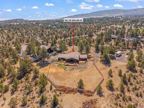 Photo of 7043 SW Highland Drive, Powell Butte, OR 97753 (MLS # 220226345)