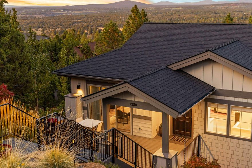 This like new home in Awbrey Village has been lightly lived in, meticulously maintained and well cared for. Some of the features of the home include a whole home humidification system, vaulted ceilings, an open floor plan, a large kitchen, a generous kitchen island as well as two outdoor living areas off the great room and dining room perfect for gathering and entertaining friends and family. Enjoy the large windows that fill the home with and abundance of natural light and perfectly frame the magical city views below. The spacious primary suite features a spa-like bathroom including a soaking tub and steam shower. On the lower level, you will find a second living area, three large guest bedrooms one with a private deck, and a spacious laundry room. The heated driveway will make those snowy Central Oregon days, a piece of cake! HOA does allow fencing.