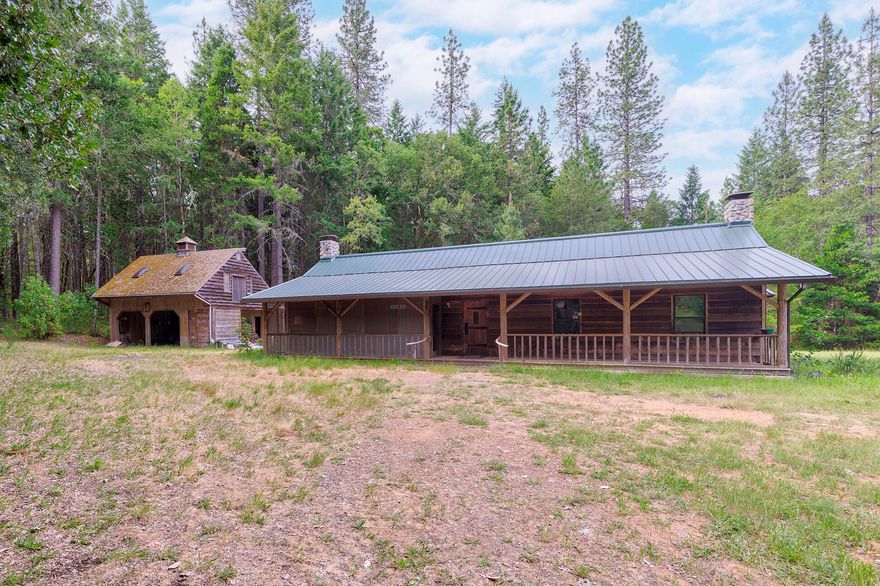 Live the Oregon Country Dream! Gorgeous 1650 square foot ranch style log cabin on over 14 private acres is awaiting you. Land is a wonderful mix of forest, meadow and pasture divided on two tax lots measuring over 7 acres each. Seasonal Kelly Creek meanders through, good well, good sun and plenty of room for gardens make this the homesteaders paradise. The well-built 2 bed, 2 bath home boasts wonderful wood beams and craftsman wood finishes, including log slab counter tops milled from the property. Two cozy fireplaces in the kitchen and great room add to the ambiance of this rustic, secluded home. There is a detached two car carport with an office/storage unit above, there are two other storage sheds for all your tools. Really a beautiful property built with love and full of history, ready for its new owners.