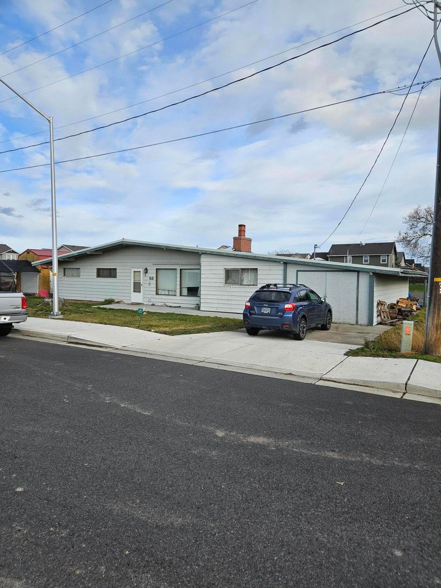 Nice spacious home in a great location.  Large lot with nice storage building.  Newer roof.  Nice woodstove for cozy winter days.