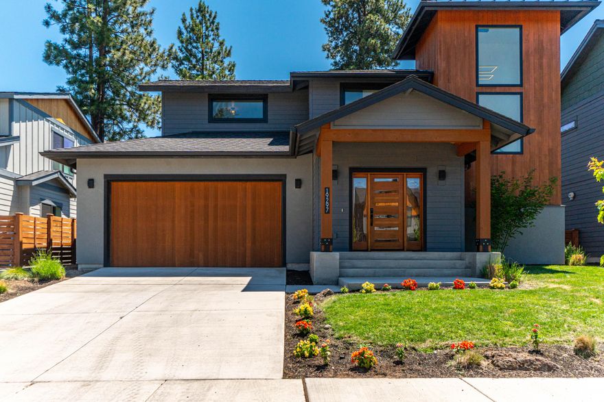 Pining for a West side retreat with all the style and functionality to support your active, outdoorsy lifestyle?  It's here. In the heart of the desirable Lodges at Bachelor View neighborhood. Recently built, lightly lived in and well maintained, this custom home features modern, elegant finishes. The open concept living area enjoys abundant natural light through floor to ceiling windows and a state of the art kitchen with waterfall concrete counters that pour from an oversized island with bar seating. The main level primary suite indulges in luxury with vaulted ceilings, access to the private, pergola covered back patio and a luxurious bath with large soaking tub & full tile shower. Upstairs, two more bedrooms & a full bath make this the perfect entertaining home without tying you to endless chores. Located right next to the extensive westside trail system, close to all the shops and dining of NW Crossing & just a quick 20 minute drive to Mt. Bachelor.