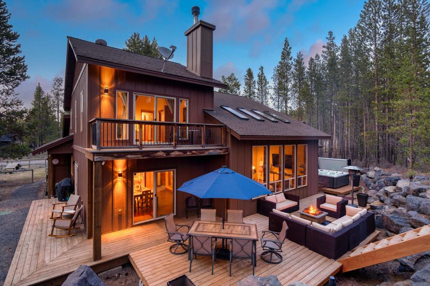 Ranked as the 4th highest-grossing 4-bedroom home in Sunriver, this turnkey, move-in-ready property has generated over $430 K in gross bookings since 2022 (including $80 K already secured for 2025). Designed for up to 10 guests, the home features vaulted ceilings, a gourmet kitchen with high-end appliances, and a dual-sided fireplace serving both the living and dining areas. The spacious layout includes two luxurious primary suites - one on each level - and a versatile loft area for extra flex space.
Outside, an expansive deck features s an 8-person hot tub and a BBQ area perfect for gatherings. Located just a 3-minute walk from the Deschutes River - famous for Oregon's top river-floating experiences - this fully furnished property also offers Starlink WiFi, no HOA fees, and complimentary property management through 2025 (with an optional 20% fee thereafter). This turnkey investment - sold fully furnished and ready to rent immediately - offers a hands-off opportunity for new owners.