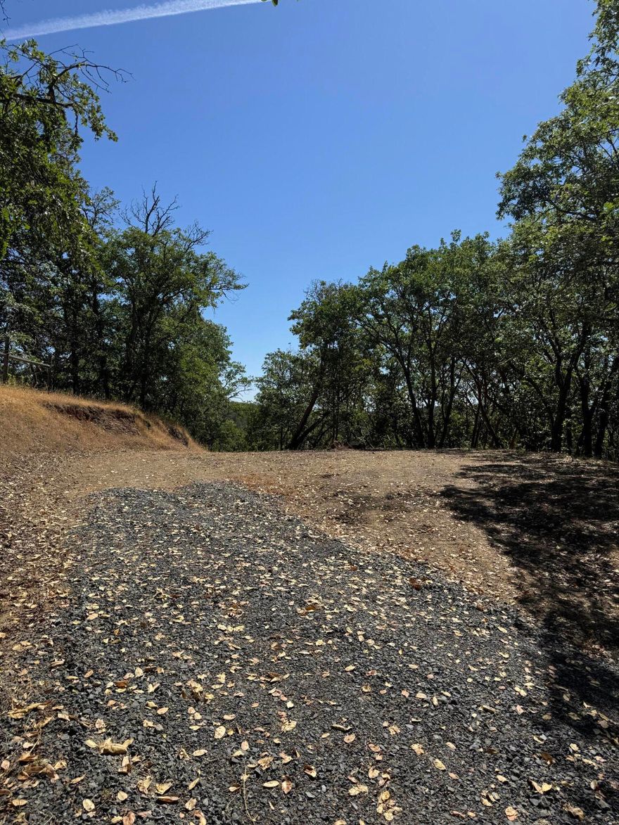 Highly sought after historic location on Old Stage Road. 5 Acres Zoned RR5 for easy site development. Never used septic installed in 2020. Easy access to I5 to Medford or Grants Pass. Site sits well back from road for privacy and quiet. Great price!