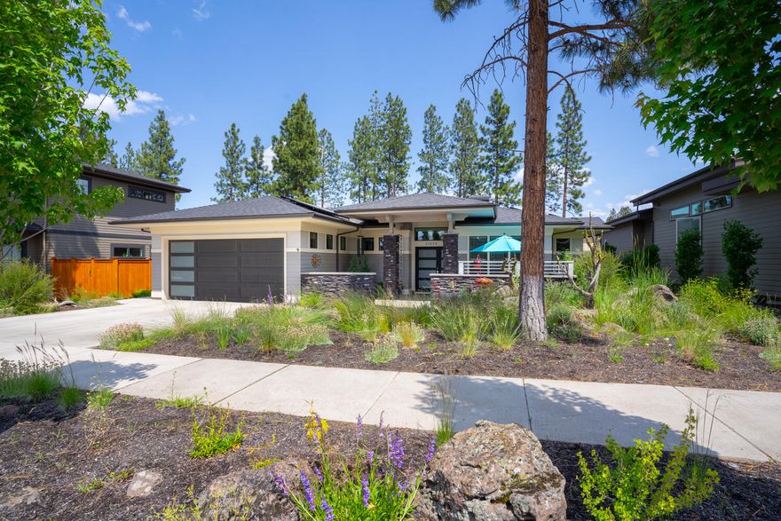 Sophisticated, contemporary, practically new single level NW Bend home w/extraordinary energy efficiency offering a resplendent chefs kitchen complete w/high end appliances, large island, custom cabinetry. Enjoy private outdoor spaces including outdoor shutters for privacy, easy to maintain, intimate patios & barbeque area. The architecturally clean lines underscore the great-room concept living & dining areas. Custom doors, skylights, & trim accents add an element of warmth & refinement throughout the home. The generously proportioned primary retreat is bathed in natural light w/adjacent en-suite spa like bath, dual vanity, large walk in closet. Two guest room accommodations, an office/study, laundry room and additional full bath complete the interior layout. Exterior features multiple patios, garden spaces w/drought tolerant landscaping. Additional appointments include central air conditioning, surround sound, automatic blinds, 18 solar panels, Tesla charging station and more.