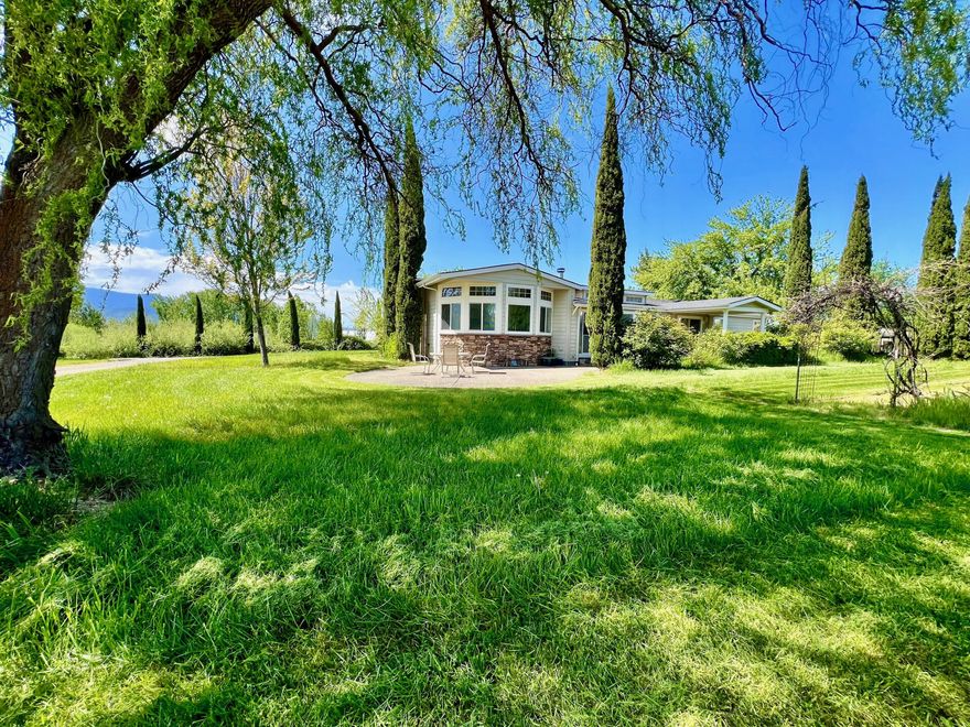 Welcome to 501 Carter Lane. The ultimate income producing property with room for growth and expansion. Upgraded and full of character, this farm home property is a dream come true. From the house, to the 9 year 5 star superhost airbnb's, greenhouses, crop field, koi pond, crystal clear delicious water, fertile soil and mountain views - this is truly one of a kind. Airbnb's have successfully produced over $100k in revenue, and can comfortably do $60k+ with minimal effort. A REC farm opportunity already built out. OMMP and ODA licensed gardens offer rental income or ability to farm it yourself. Endless well, multiple water sources, 1 million gallons TID water allocation rights lend you ability to meet and exceed farming dreams. A 2680 sqft. beautiful home, 800sqft barn home with a giant porch, cottage, cabin, and tiny home allow the entire family to move in. Comes with all the farm equipment needed to get started growing and mowing. Awesome, unique and full of character! Dream come true