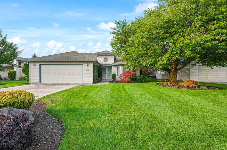 Immerse yourself in comfort with this splendid 3-bed, 2-bath condo in the heart of Harbor Isles, lakeside community.  Enjoy the ease of one-level living and the convenience of a 2-car garage. Beautiful hardwood floors add timeless charm while offering a seamless flow throughout. Indulge in the serene view of the adjacent golf course, a picturesque backdrop that complements the beauty within. Revel in the luxury of a recently remodeled kitchen featuring stylish white shaker cabinets, elegant tile floors, and high-end appliances.  Both bathrooms are remodeled with a custom walk-in shower in the primary bathroom.  Stay organized effortlessly with custom closet organizers, enhancing the functionality of your space. Your dream home awaits - experience a blend of modernity and comfort in every detail.