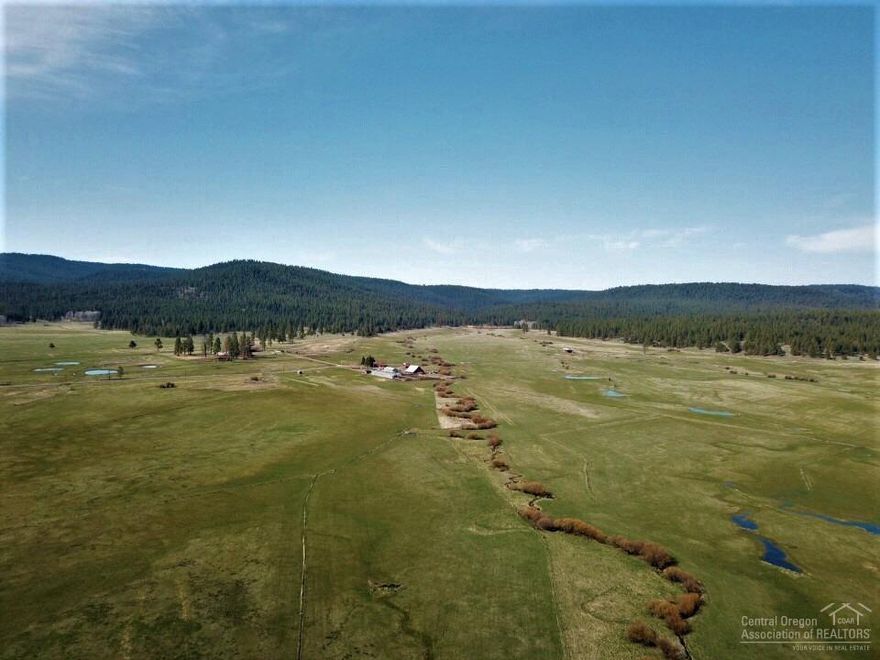 You won't find a better cattle ranch than this. For the first time ever offered to the public, this great ranch has an impressive production history. Currently, the operator summers a combination of 500 cow/calf pairs and produces 1,200-1,500 ton of hay annually. With approximately 1,500 acres of meadows, 3,000 acres of rangeland and a 25,000 acre private forest permit, this ranch is a cattleman's dream. Miles of mountain streams, rich fertile grassy meadows, pastures and great stands of healthy timber.