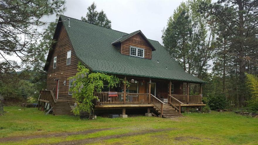 A Creek Runs through it! Nice custom built cedar home in 2002, 3 bedrooms 3 baths with attic pull down for storage, vaulted ceilings with 22' being the highest point, laminate flooring & tile throughout. Situated on 4.85 level acres with seasonal China Creek frontage, has certified water rights on William for irrigation. Seller has hand lines included in purchase price. Level pasture fenced and cross fenced, good well per owner. Small shelter for animals, carport and chicken coop.