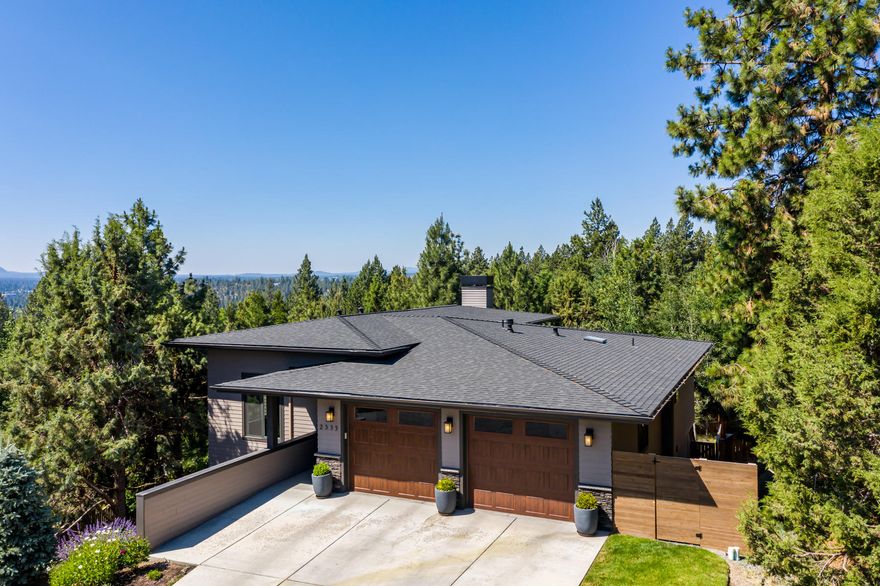 Beautiful custom mountain modern home built and remodeled (2019) by the fine craftsmanship of Madrone Construction and discerning style of Harper House Design. Located on a private cul-de-sac, direct access to a walking path, 2 blocks to Hillside Park and close proximity to westside and downtown amenities. Southwest orientation provides abundant natural light and vistas that extend to southern buttes. Interior features towering ceilings, designer finishes, white oak hardwoods floors and a gourmet kitchen with professional appliances and wet bar with 2nd dishwasher. Great room has wood burning fireplace and access to outdoor living. Luxurious main level master suite has radiant heated floors, freestanding soaking tub and access to hot tub patio. Lower level features large bonus room with gas fireplace, 2 more en-suite bedrooms, 4th bed and full bath and more. A fenced yard, multiple decks and paver patio for great outdoor living and oversized garage with built-in storage top it off!