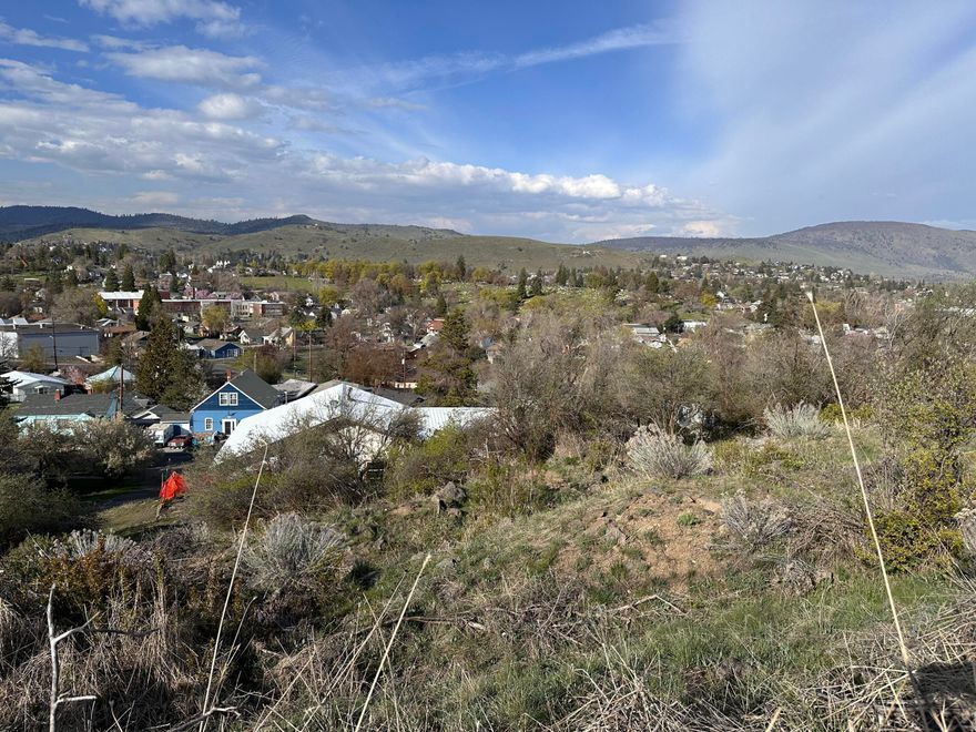 Check out this .26-acre lot, offering endless potential for investors and builders alike! Zoned for medium density, it's the perfect spot for a duplex or triplex, whether you're creating rental income or a multi-generational home. Its elevated location provides stunning views, adding to the appeal. Opportunities like this, at such a great price, don't come around often—make it yours today!