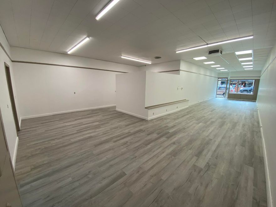 Prime renovated commercial space for lease in the heart of downtown Redmond located directly across the street from Diego's & a block from Centennial Park with easy access to Hwy 97.  This space offers an open layout with new custom LED lighting throughout, new paint, new easy to clean luxury vinyl plank flooring, new ceiling tiles, additional insulation, large window display area, front & alley access with lots of parking, private dedicated parking space, updated bathroom, kitchen area, & back office/storage room. Prime downtown spaces like this rarely come available! Call today to set up a viewing. Lease rate is $2,000/mn .