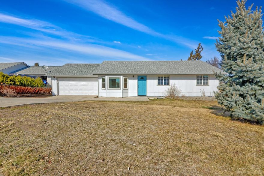 Single level with open floorplan, generous sized front and backyard offering views out over surrounding area. Enter into living room with vaulted ceilings and hardwood floors open to dining area, adjacent kitchen and slider out to fenced backyard. Added door at rear of the garage allows drive through access to additional parking slab in back. Several updates include new interior and exterior paint, kitchen updates and new carpet in all bedrooms.