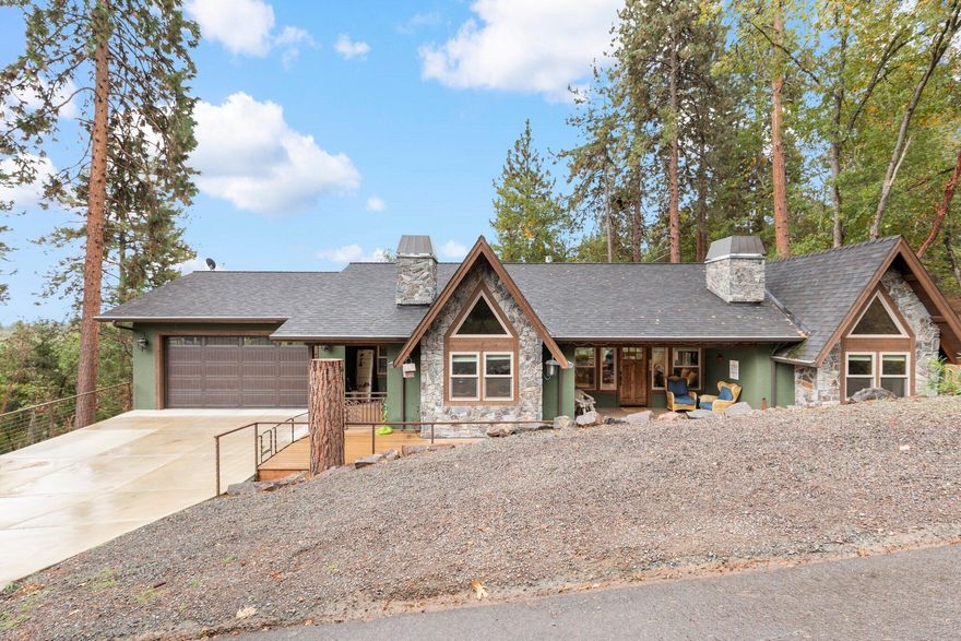 This stunning 3-bedroom, 4-bathroom craftsman home is a true masterpiece! Boasting incredible woodworking detail that showcases exquisite craftsmanship throughout. With 3,860 sqft, this floor plan provides an abundance of space and comfort. The great room exudes warmth and comfort with its cozy fireplace. The kitchen is a true masterpiece, featuring gleaming countertops, top-of-the-line appliances, and abundant natural light, making it a beautiful and functional space for culinary enthusiasts. Next to the kitchen is the butlers pantry which is high quality and second to none. Don't miss the library/sitting room on the main level with it's own fireplace. The large master suite includes a walk-in closet as well as a gorgeous bathroom with a separate shower and tub and a double vanity. The home also has a second primary and an additional bedroom and a den that could easily be used as a fourth bedroom. Located in a serene and peaceful neighborhood on a large lot with gorgeous views.