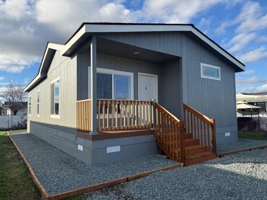 BRAND NEW MANUFACTURED HOME!  This very nice 2 bedroom/2 bath home is located in an all ages park!  There's also an additional room/office space which could be used as a 3rd bedroom.  Home comes with stainless steel appliances. It has a cute little front porch and a nice sized yard in the back.  Won't last!