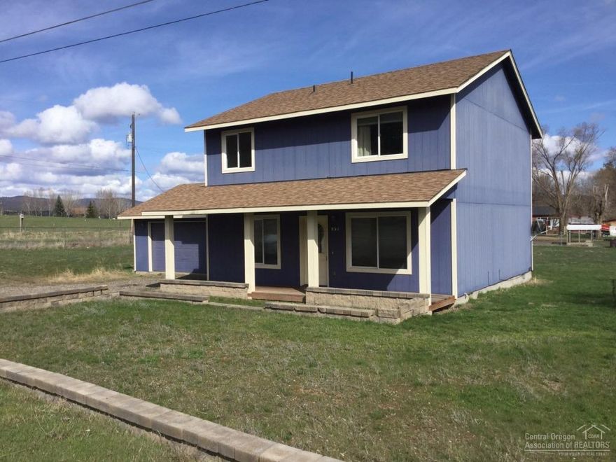 Great Opportunity to own this great two story home just minutes from town Located on 1.5 Acres with out buildings fully fenced. with lots of room. New Carpet and Paint inside. Forced Air Heat pump Large Utility room and tons of Storage. Must see!!