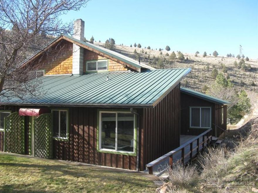 2 STORY HOME ON 10 ACRES! Nice location, Log home with site built addition, open floor plan, vaulted ceiling, tiled entry way, 5 bedroom, 2 bath, 2640 sq ft, office, utility and bonus rooms, vinyl windows, oil heat, deck, landscaped, fruit trees, circular driveway, storage sheds, RV area. $189,000 #823