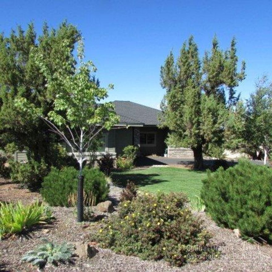 This warm and inviting home is located on a peaceful quiet St. in Eagle Crest. It has easy access to miles of walking & biking trails as well as the hiking trail of Cline Butte. An open floor plan with oversized rooms filled with lots of light and views of Smith Rock. Kitchen is a cook's dream w/lots of counter space, cabinets, tile & 4' x 9' granite island. Oversized garage has room for a shop. The 600+ sq ft trex deck has a pergola. This home is easy living and a must see w/ many more upgrades!