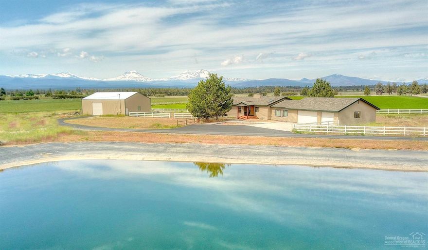 Wrap around Cascade Mtn Views! Situated in Cloverdale, the center point for Central Oregon recreation. Nearly 2300 sf of single level custom home w/mtns views from every massive window. Hardwood floors, Granite counters, tiled bathrooms, mud room, huge bonus room & 3 car garage. EFU zoned, 2 tax lots, pressurized irrigation w/36x48 shop w/220! Enjoy the best fishing in the area in your back yard! All new interior finishes, exterior paint & windows. Private paved drive lined w/white vinyl fencing. Turn key!