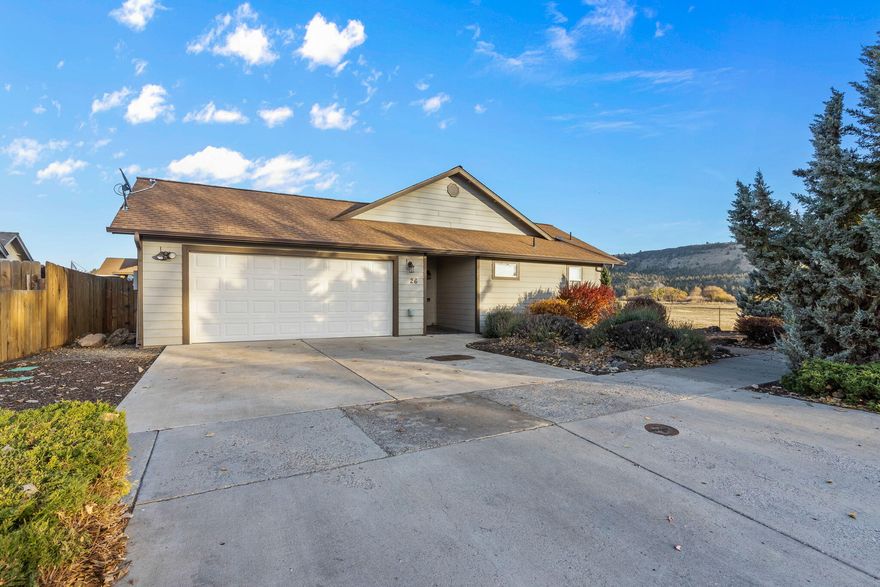 Welcome to this very well-kept 3-bedroom, 2-bathroom home, ideally located at the end of a peaceful street bordering serene pasture land. Experience the
perfect blend of tranquility and convenience with nearby parks, shopping, and dining. This energy-efficient gem features a privately owned solar system and on-demand hot water for cost savings.The open floor plan with vaulted ceilings creates a spacious atmosphere, while the large kitchen is perfect for culinary enthusiasts. ADA accommodations include level flooring, wide doorways, and curbless tile showers, ensuring comfort for everyone. Three sets of French doors open from the great room, master suite, and guest suite to a private back deck, perfect for entertaining or relaxing with beautiful views. With low-maintenance landscaping, spend less time on chores and more time enjoying your new home. Don't miss this opportunity to own an efficient, inviting sanctuary in a highly sought-after location!