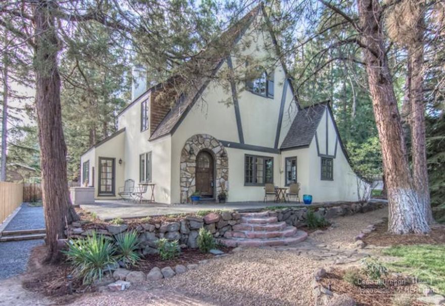 This property is truly one of a kind. Timeless and classic, this home exemplifies having the best of both worlds. Elegant modern conveniences blend old world charm with current design. Spacious rooms, extensive hardwood flooring, wood burning fireplace, and a delightful sunroom that soaks in the southern exposure and filtered views. One floor is dedicated to the master suite w/ its own private deck and view of Bachelor. Private patio leads to the expansive backyard complete w/ a water feature.