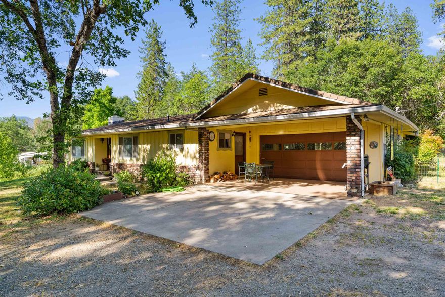 This is the 1st time on the market for this country cute, 3 acre mini farm, so don't miss out. One family has loved and taken care of this unique  property since the 70s.  The main house is 1326 sq. ft., has 2 bedrooms & 2 full bathrooms. The kitchen is open to an eating area and nice sized living room with a fire place. In the back you will find a screened in patio to enjoy those summer evenings.  The land is flat and usable with a beautiful pond and a seasonal creek. There is a good sized shop for all your toys or tools as well as a detached garage. This property also has a 2 bedroom, 2 bathroom doublewide and a 2 bedroom, 2 bathroom single wide, these 2 homes are non-confirming to the current county code. Buyer to do their due diligence. So many options here. Call for your viewing today!!!