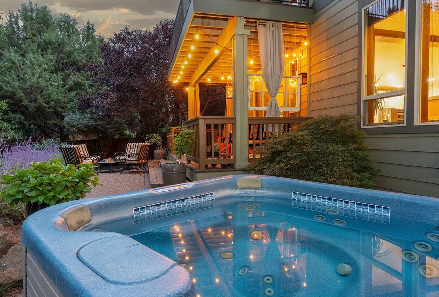 Welcome home to this inviting residence in the desirable Awbrey Park community that puts you in the center of it all! Revel in 300+ days of Central Oregon sunshine in the expansive outdoor living spaces, and soak in the hot tub under a canopy of stars in the private and fully fenced backyard. Comfortable floor plan provides lots of possibilities in 3,247 sq. ft. of well-designed living space featuring 3-bedrooms, 3-full baths, office, bonus loft area, and a second family room. Streamed in natural light, the kitchen offers spacious granite countertops, abundant cabinetry, walk-in pantry, breakfast bar, island, and stainless appliances. Hardwood floors, vaulted ceilings, exposed beams, 3-fireplaces, stone and tile accents, and plentiful wood wrapped windows throughout exude mountain charm. Oversized 3-car garage with sink and backyard access is well suited for hobbies and gear and you'll enjoy easy entry to the laundry/mud room off the garage. Live the Bend lifestyle in a big way!