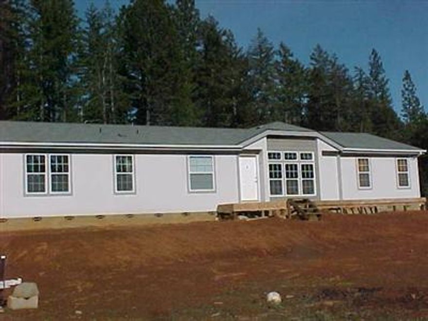 Near New D/W Mfg Home W/A Fantastic Floor Plan. This Is A Very Spacious Home W/A Great Kitchen, Island Work Space, W/Extra Cab/Storage Below. Tile Edge Counter Tops, & All Stainless Steel Kit. Appliances, Inc B/I Microwave. Huge Bath In Master, Extra