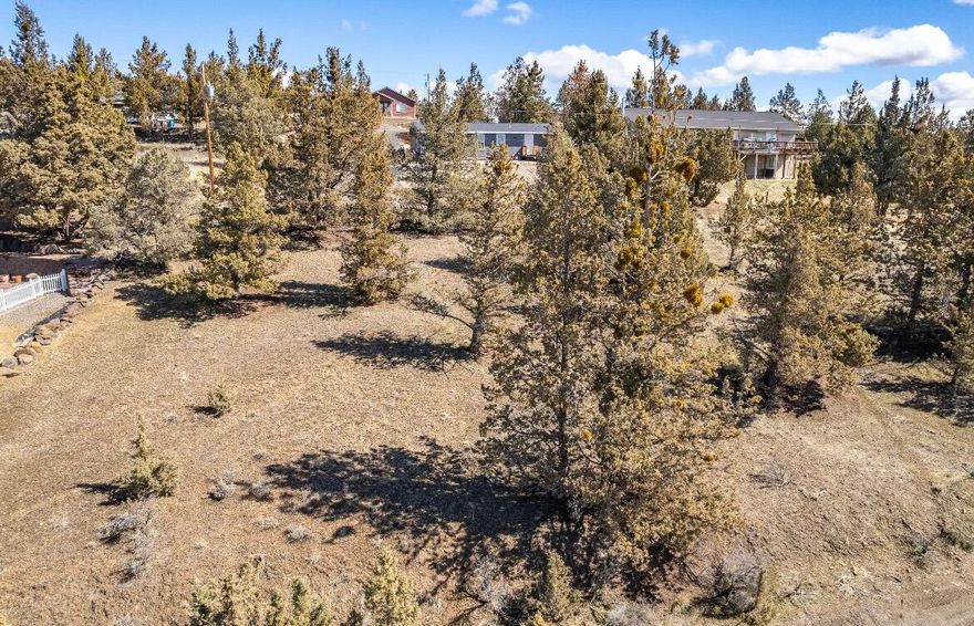 Build your dream getaway just 20 minutes north of Prineville in the scenic Ochoco West community! This .21-acre lot comes with community water, sewer, power access, and garbage service.

Zoned R5 - Rural Residential , with tons of potential. This property provides flexibility for a variety of residential uses, whether you're planing to build now or invest for the future.

Enjoy over 1,200 acres of private land, a fishing lake, pool, horse stables, shooting range, and more. 
Don't miss this rare opportunity for affordable land with unbeatable amenities.