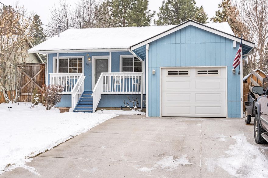 Updated home in Mid Town!!! Home features 3 bedrooms, 1.5 bathrooms including master bed & bathroom with walk-in closet. Inside you will find an updated kitchen with quartz countertops, custom white cabinets, and stainless-steel appliances. Engineered hardwood floors, carpet in bedrooms. Updated bathrooms with quartz countertops and cabinets. Home also features natural gas for furnace, stove, and dryer. New high efficiency central heating/air.  New roof in 2012 with 30-year warranty. Fully fenced property with beautiful landscaping, front, and rear sprinkler system. Large, covered patio with small bar area for entertaining, water feature, new arctic spa hot tub.  Other outbuildings include small workshop, woodshed, and covered shed for motorcycle/small items. RV parking behind the home with RV Pad. Single car garage with storage above. This adorable home has plenty of storage and parking for all your needs.  Walk to Juniper Park & Swim and Pilot Butte.