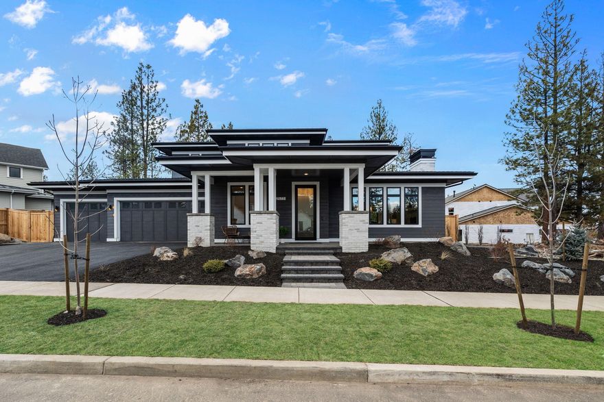 Come explore this stunning prairie home by Fusion Homebuilders in Shevlin West, Bend's premier neighborhood w/close proximity to trails, National Forest, parks, restaurants, and more! A contemporary design with room to sprawl, this home is built to impress.  An ideal floor plan features a great room, kitchen, and office on the main. 10-foot-high ceilings, tall windows, Thermador appliances, floor to ceiling cabinetry, & primary on main are a few of the exceptional features that set this home apart. A soft yet modern interior design package offers clean lines and a warm feel unique to this home. Upstairs an ensuite, 3rd bedroom, bathroom & large bonus rm provide space for guests w/ mtn views. A generous backyard and covered patio are an ideal space for outdoor entertainment. A large mud room & 3-car garage provide plenty of storage for all your outdoor gear. Amazing quality & design that you must see for yourself!