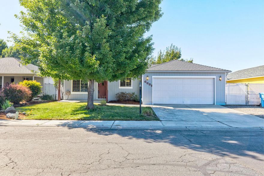 Super clean, three bedroom, two bath, single level, 1121 SqFt, move-in ready home in McLoughlin Meadows Subdivision in beautiful Eagle Point. This home has been very well cared for -newer HVAC system, NEW carpet in bedrooms, sprinkler system in front and back, two car garage,  fresh landscaping and professionally cleaned, ready for you to move right in!  THIS HOME IS IN THE USDA ELIGIBLE LENDING AREA and a stone's throw from Chamberlain Park, conveniently located, close to town, schools and shopping.  Don't let this one slip by! It won't last long!