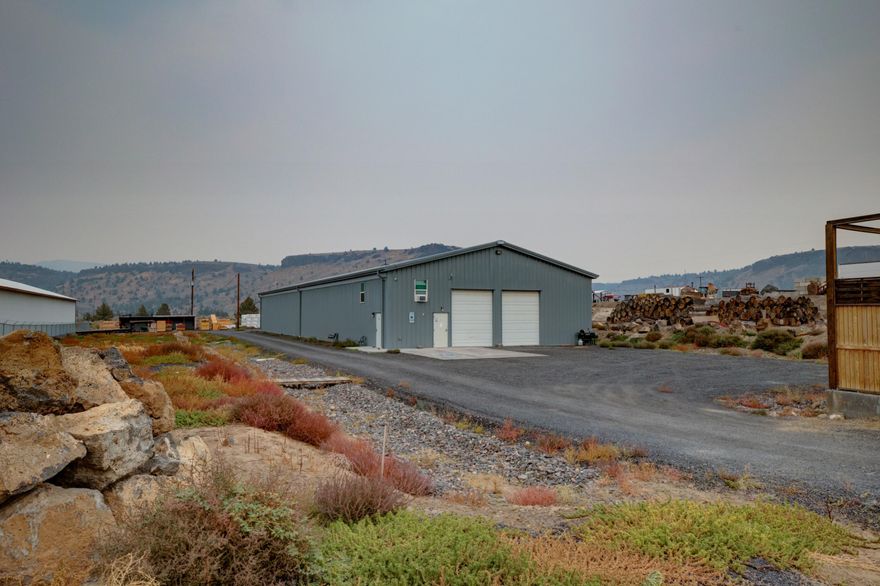 MOTIVATED SELLER BRING OFFERS! This spacious manufacturing building featuring 7500 sq ft, sitting on 1.23 acres built in 2019 is ideal for various industrial applications, with ample room for production and storage. Designed for efficiency and productivity, the manufacturing space provides a well-structured layout that can accommodate various machinery and operations. The presence of a Conex (container) in the back offers extra storage capacity. The property features enough room for semi-truck turnaround, facilitating easy access for freight transport.