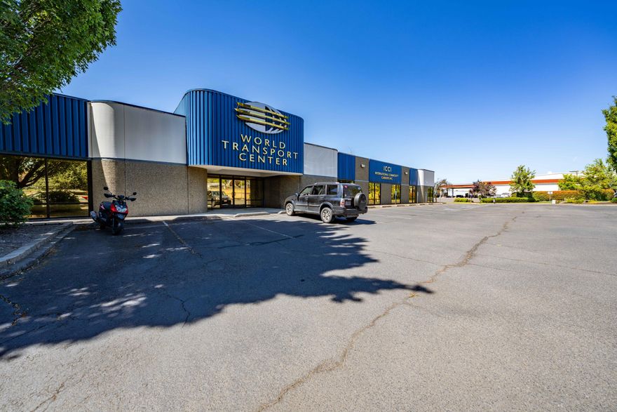 Exclusively presented for direct lease - 2090 Commerce Drive, an iconic highly-visible office space fronting Hwy 62 in beautiful Medford, Oregon (the ''Space''). A trophy building on Hwy 62 with visibility to nearly 35k VPD, the aptly named World Transport Center building is purpose-built to house high-quality office users. The tilt-up concrete building is built to institutional standards, and features no interior structural walls, allowing users to customize the space to their exacting designs. Interior features reception area, tall ceilings, expansive bull-pen style central office core, oversized kitchen & break room, multiple enclosed offices with private access, restrooms, server room, & large exterior west-facing patio. In-place infrastructure is rare, with a large dual-fuel backup generator, rooftop solar, central HVAC, and much more. The front and rear parking lots feature 82 designated parking spaces + on-street space. Contact brokers today for more info!