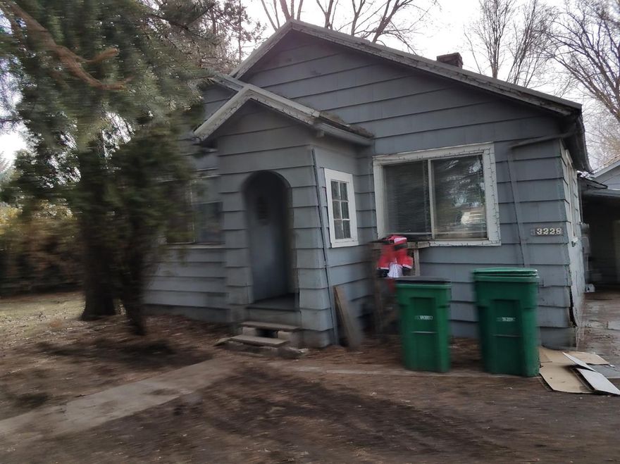 This home would make a nice first home or rental. 3 bedroom 1 full bath. Nice sized back yard. Detached garage. Small covered side entry way. Close to bus route and shopping