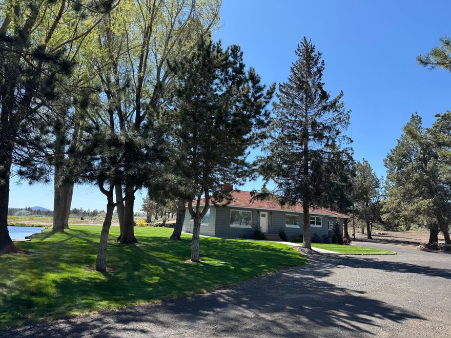 Welcome to your private sanctuary in prestigious Bend Oregon on 36.33 private acres just 10 minutes from Downtown, this unique property offers a rare combination w/ 9ac  Sweetheart  5ac  other  11 acres of orchard grass, open pasture 20.32 ac COID water Encompassing the once in a generation opportunity to own the first sweet cherries in Bend Oregon. Endless agribusiness possibilities well-suited for a U-Pick cherry ranch, picturesque wedding venue, & relaxing ranch retreat. Conditioned & lighted basement convert to full living spaces make a total 2824 sq ft ,Relaxing hot tub w/panoramic views snowy winters & gorgeous sunsets. 48X96 barn/ shop w/ RV parking, separate septic & water for added uses, extensive fencing entire ac& a peaceful, secluded setting. Bend Cherry Company is unique as it's the very first & only one in Bend Oregon.Tons of potential,  photogenic charm for all outdoor opportunities. This remarkable property is primed for a dedicated family & or agribusiness opportunity