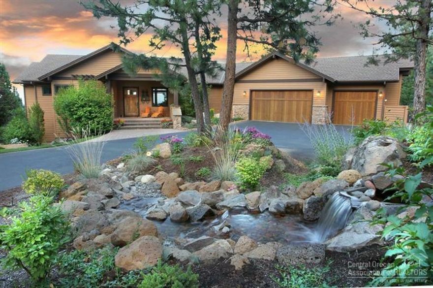 Private retreat with outstanding mountain and city views. Entertainers delight both outside with spacious patio and BBQ and bar overlooking your personal USGA golf green and inside with gourmet kitchen including Wolfe range,Viking and Meile SS appliances. Quality throughout with exposed beams,custom cabinet and doors. Montana mossy rock fireplace in the great room and master suite all on the main level. Lower level has a media, exercise room(or wine cellar), abundance of storage, 3 car garage w/sho