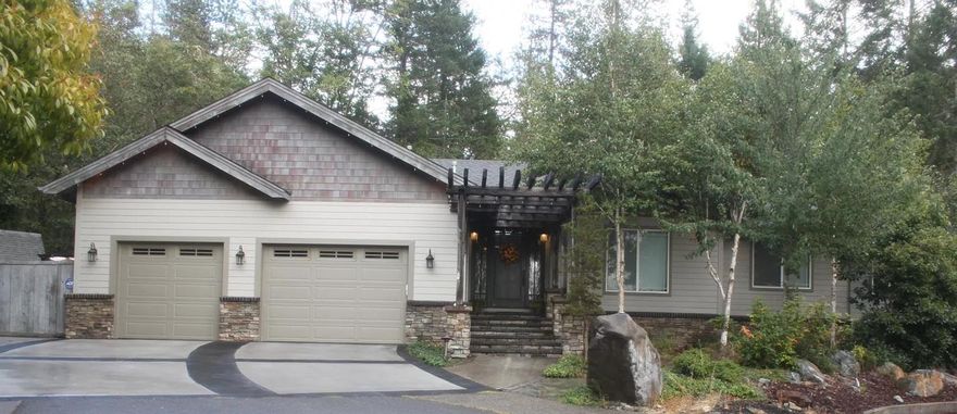 The backyard is like something you'd see at Disneyland. The home is in the city limits but very private! Attached art studio with separate entrance. Large pool with waterfalls, solar panels for pool, built-in fire table, outdoor kitchen, tree house, RV parking, tool shed, access to public trails, BLM surrounds property, oversized garage with lots of storage.