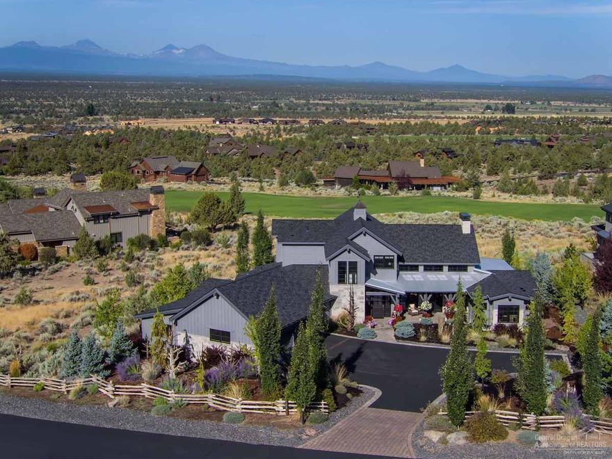 Once in a great while, a rare house becomes available in a special neighborhood - one that offers three master suites with incredible finishes, a stunning great room perfect for 100 person parties and an oversize kitchen that meets the expectations of every gourmet chef. This is that house. Over 3000 square feet of paver stones provide the idea outdoor living experience year round. The north end of the patio is covered, and the views to every direction are equally stunning. Two of the three bedroom suites are ground level, the third includes a sitting area and a built-in desk. Lastly, the three bay garage offers storage and a shop attached to the garage. The property backs to the Brasada Ranch golf course. The infinite details are too many to list, let the photos speak for the house.