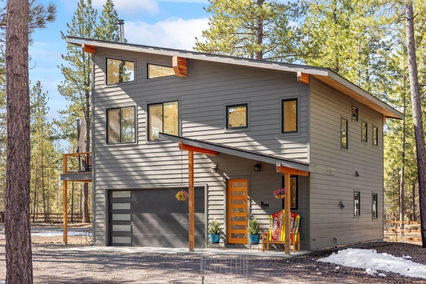 This stunning, nearly new home blends sleek modern design with cozy Central Oregon charm. Thoughtfully designed, this retreat features soaring vaulted ceilings, a warm and inviting wood stove, and high-end finishes throughout. The open-concept layout is perfect for both relaxation and entertaining, with premium touches that elevate every space.

Step outside to a fully fenced yard with ample room for RV parking or space to build a shop on over half an acre. A heated garage ensures year-round comfort and convenience. Located just down the road from the Deschutes River, this home is a dream for nature lovers, offering easy access to fishing, kayaking, and scenic trails.

Whether you're seeking a full-time residence or a weekend escape, this property, just 25 miles south of Bend, delivers modern luxury in an unbeatable setting.