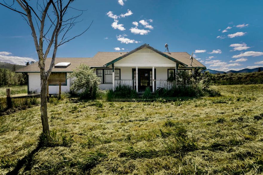 Fun Old Home on 2.83 Acres. NEEDS LOVE. Perfect for Investor/Flip. Rural Character and Charm. Share a Private Pond with your neighbors! This 3 bedroom , Oversized primary bathroom with another half bath and Alot of Sunshine Needs personal touches and fun remodeling to come back to Life! So Much Potential Here ! Open floor plan with good sized Kitchen. Quirky built ins and Style! NEW Water Heaters(2) Excellent Location on a GREAT LOT.