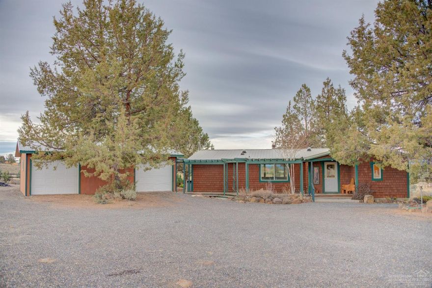 Beautiful Cascade view as the backdrop behind adjoining 90-acre pasture w/walking track. You'll love the knotty pine throughout the home. The Inglenook awaits your heating stove of choice, w/lots of window to enjoy your Mt. view. The kitchen has been updated & home offers a wonderful craft/storage room. A covered walk leads to dbl garage w/2 overhead doors. But that's not all! Large shop has room for all your vehicles & toys w/10x10 pull-through sliding doors & overhead door. Both with concrete floors/pwr.