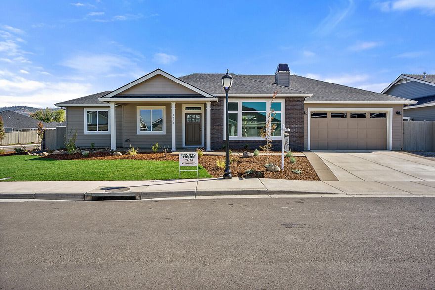 Built in a beautiful country setting on corner lot in Medford area with views of surrounding mountains nearby! An exceptional quality builder that we've grown to love in the valley throughout the years is what you get when you purchase a home built by Pacific Trend Building Company. A stunning craftsman styled home with approximately 1729 sq ft, 3 bedrooms, 2 full baths. Features an open kitchen with beautiful granite counters and brick kitchen backsplash. Includes high-end light fixtures and a gorgeous brick fireplace. Custom cabinets are birch and alder with the highest quality in the industry. Luxury vinyl plank flooring in the entry, kitchen, living room and hallways. Bathrooms and laundry include tile flooring. Professional landscaping in front and back round out this home. Other lot and home packages are available! Listing Agent is related to Seller. Pictures are for illustration purposes only.