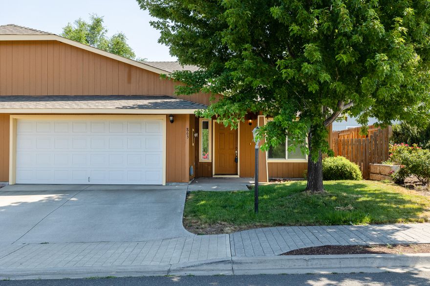 Beautiful single story home with vaulted ceilings in the living room and kitchen, open floorplan, private fenced backyard with storage shed. This home has central A/C and pride of ownership.