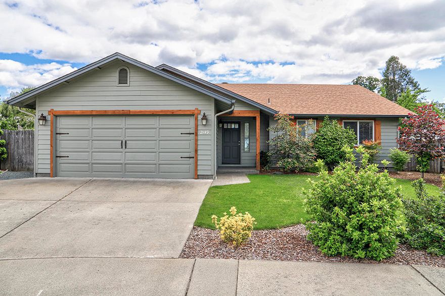 Beautifully Remodeled Home on a Quiet Cul-De-Sac in a Great Neighborhood. This lovely 1494 sq ft home on a .15 Acre lot features 3 Bedrooms, 2 Bathrooms, an open Great Room Design with Lots of Sunlight and easy access to the Covered Back Patio and Yard for entertaining your family and friends. This home was Completely Remodeled in 2018, with Laminate Flooring, Solid Surface Counters, Stainless Appliances, all new fixtures, New HVAC System, and an updated Kitchen Island. Vaulted Ceilings in the Great Room give this home an open and spacious feel that invites you in. This Home is within easy walking distance to Reinhart Memorial Park and the Rogue River. You'll want to come see this home soon.