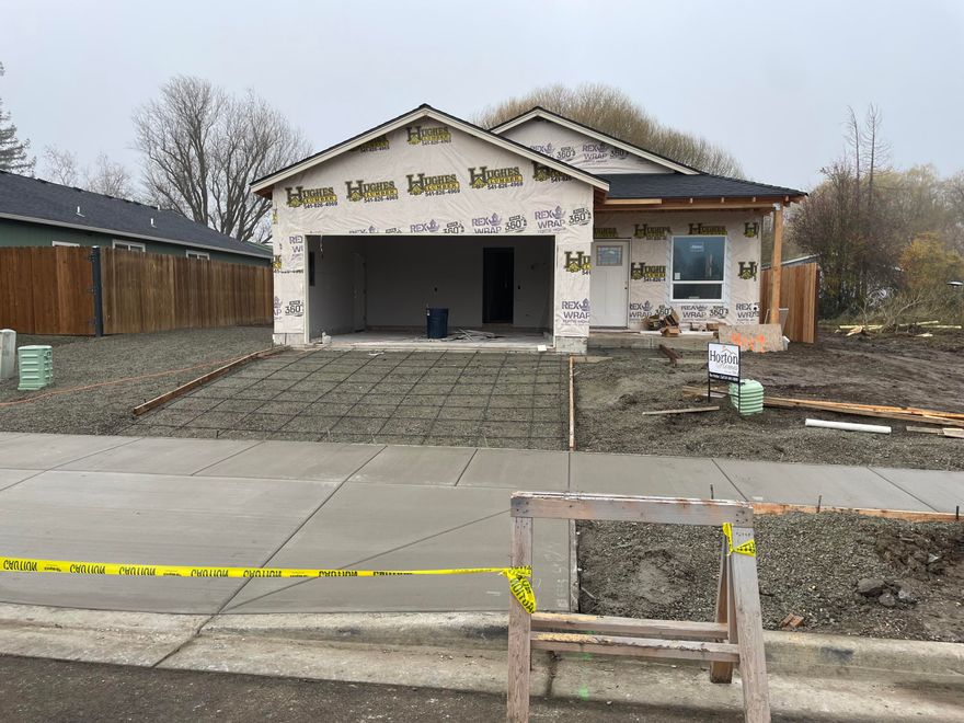 BRAND NEW HOME in West McAndrew Subdivision! Home is located back in a small neighborhood and Built by local builder, Horton Homes Inc..  Gorgeous 1410' sq.ft, single level living. 3 bedroom, 2 bath.  Open floor plan with vaulted ceilings makes this home feel spacious. Home features, open concept floor plan,  Custom cabinets, Granite, Gas appliances, Vaulted Ceilings, Walk in closet, Laminate flooring, Covered back porch.  Approx.12' x70' Side Parking and much more. Selling agent is related to Seller and Builder. All information is provided in good faith and is believed to be true and accurate. Pictures are for illustration only but will be  very similar to actual.