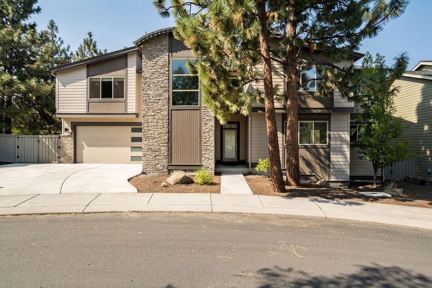 Modern stunner in one of Bend's coveted NW neighborhoods. This ideal open concept floor-plan is perfect for entertaining + comfortable living- tons of space for everyone. Boasting exceptional natural light + high end finishes throughout. Gourmet kitchen with custom alder cabinets, quartz + a large island + SS appliances. Grand primary suite with high ceilings + luxurious primary bathroom + giant closet. Main level + and grand entry welcome you into spacious main level living areas. Large bedrooms + upstairs bathrooms combined with a spacious bonus room. Ideal outdoor living space coupled with a dreamy low maintenance oasis including a charming backyard BBQ patio. Located at the end of a cul-de-sac close to all your everyday amenities, multi-use trails, NW Crossing + Bend's West Side.