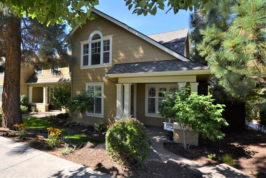 Welcome to Northwest Crossing. This well appointed end unit townhouse faces Lewis and Clark Park and is just blocks away from restaurants, schools and shopping. This one owner home is incredibly spacious at 1,970 +/- sq ft and features 3.5 inch plantation shutters throughout. On the first floor you will find the comfortable living room with gas fireplace and soaring vaulted ceiling. The kitchen highlights stainless appliances, granite tile counters, center island with breakfast bar and a large pantry. Enjoy having the master on the main with walk-in closet, double vanity, soaking tub and separate showing. There is also a spacious dining area, laundry room and half bath plus an over size 2 car garage with alley access. Upstairs there is a loft area, 2 guest bedrooms and full bath. The private side yard highlights newly installed sod, garden area and spacious patio. Stay comfortable year round with natural gas forced air & AC. New roof & exterior paint in 2019. Your next home awaits!